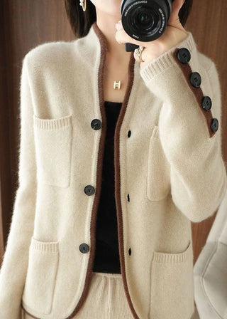 Beige cardigan med kontrastkant