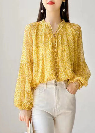 Blomstret gul bluse med bindebånd
