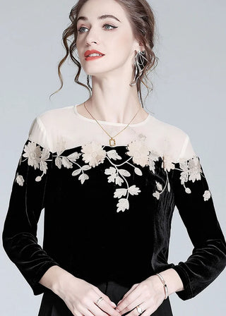 Velourbluse med blomsterbroderi
