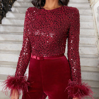 Elegant jumpsuit med fjerdetaljer