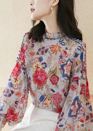 Blomsterbluse med volumenærmer