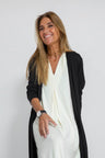 Hvid kjole + sort vest